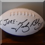 C02. Football signed by Tedy Bruschi. 